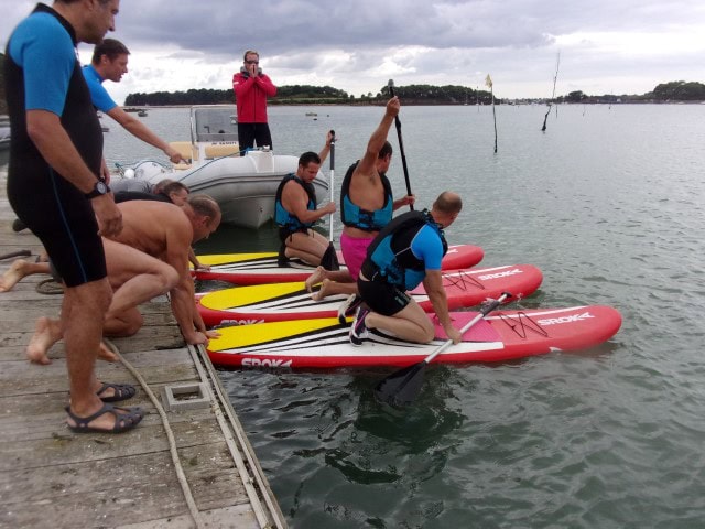 relais sportif paddle board Sroka pendant un rallye nautique nautic , team buildind , insentive